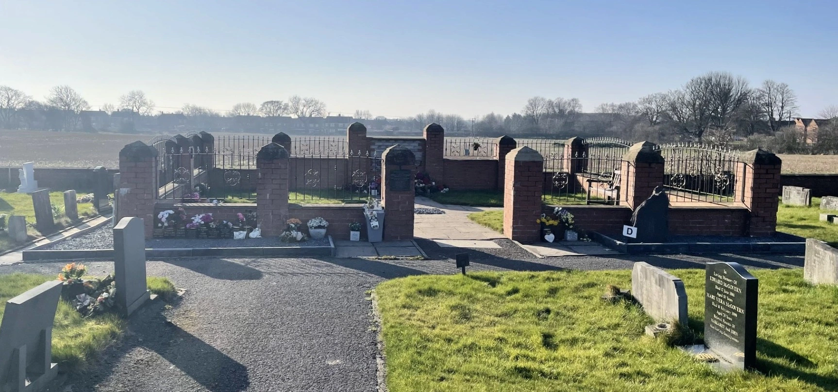 Plaques and memorial features within the Garden of Remembrance